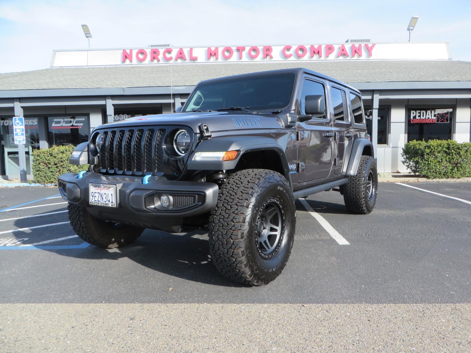 2023 CHARCOAL /black Jeep Wrangler Unlimited Willys 4XE (1C4JJXN68PW) with an 2.0L L4 DOHC 16V HYBRID engine, 8A transmission, located at 2630 Grass Valley Highway, Auburn, CA, 95603, (530) 508-5100, 38.937893, -121.095482 - 3" Zone Offroad lift kit, Fox Adventure series shocks, 17" Method Race wheels, 37" BFG KO2 tires, and a Teraflex spare tire carrier. - Photo #0
